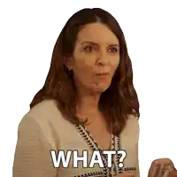 a woman is holding a glass of wine and says what