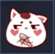 a white cat with red hearts on its face is eating a candy .