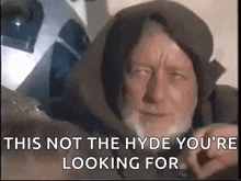 an old man with a beard is wearing a hood and says this not the hyde you 're looking for