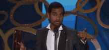 Emmys 2016 - Aziz Ansari GIF - Emmys2016 Aziz Ansari Award GIFs