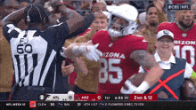 a football player wearing a jersey with the number 85 on it