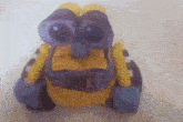 a toy that looks like wall e from the movie toy story