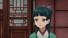 a girl in a green kimono has a stick in her head