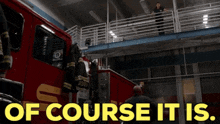 a red fire truck with the words of course it is on the bottom