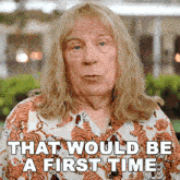 a man with long blonde hair is wearing a shirt with tigers on it that says that would be a first time