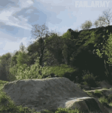 a blurred image of a landscape with failarmy written on the bottom right