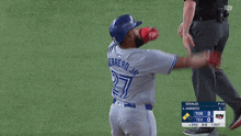 a baseball player with guerrero jr. on the back of his shirt