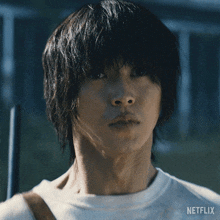 a close up of a man 's face with netflix written on the bottom