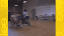 a blurry photo of people dancing in a room with a yellow border that says ' ice '