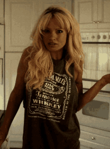 Lily James Pamela Anderson GIF - Lily James Pamela Anderson What GIFs