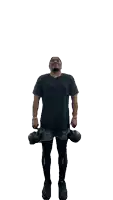 a man in a black shirt is holding two kettlebells over his head