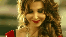 ابتسامة نانسي عجرم ضحكة ابتسام ابتسم GIF - Nancy Ajram Smile Video Clip GIFs