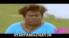 a man wearing a blue shirt and a necklace with the words starttamilchat.in written on the bottom