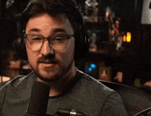 a man with glasses and headphones says " do n't "