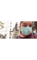 a girl wearing a mask and a shirt that says busy on it