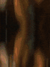 a close up of a person 's face with a blurred background that says ' i love you ' on it