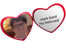 a heart shaped mirror says clark kent my beloved on it