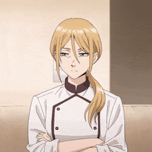 a woman with blonde hair is wearing a chef 's jacket and has her arms crossed