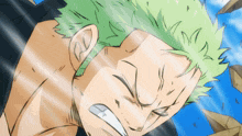a close up of a person 's face with green hair and a blue sky in the background