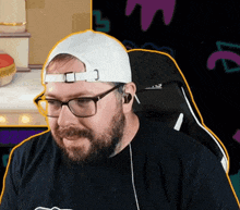 a man with a beard wearing a white hat