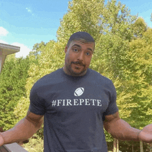 a man wearing a shirt that says #firepete on it