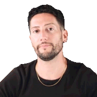 a man with a beard is wearing a black shirt and gold chain around his neck