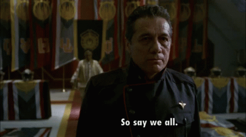 GIF features a clip from the (2004) Battlestar Galactica of Commander Adama's rousing and motivation speech announcing the quest for the fabled 'Earth' and the caption: "so say we all."
