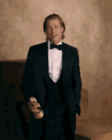 Brad Pitt Golden Globes Award GIF - Brad Pitt Golden Globes Award Trophy GIFs