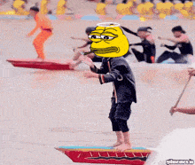 a cartoon of a boy with a yellow face and a halo on his head is on a boat on the beach