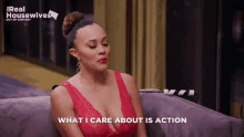 a woman sitting on a couch with the words what i care about is action