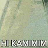 a close up of a car windshield with the words hi kammim on it