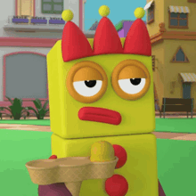 a cartoon character is holding an ice cream cone and wearing a jester hat