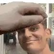 a man is wearing a hat and smiling while a hand is holding it over his head .