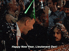 a man in a party hat says " happy new year lieutenant dan ! "