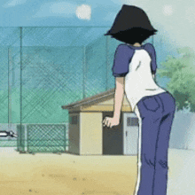 a girl in a blue and white shirt with the number 1 on the back