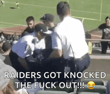 a picture of a raiders fan being knocked out with the caption " raiders got knocked the fuck out !!! "