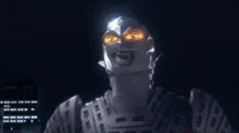 a man in a superhero costume has a green light coming out of his head
