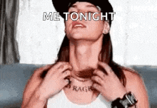 a woman in a hat is scratching her neck and says `` me tonight '' .