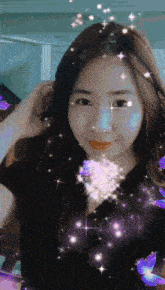 a woman with purple butterflies and stars around her