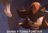 shadow the hedgehog and rouge the bat standing next to each other
