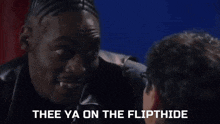 a man talking to another man with the words " thee ya on the flipthide "
