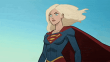 a woman in a superman costume with a red cape