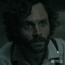 a close up of a man 's face with the words hang on netflix on the bottom