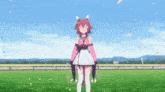a girl in a pink and white dress is standing in a field with confetti falling around her