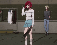 a girl with red hair is holding a sword and a man stands behind her