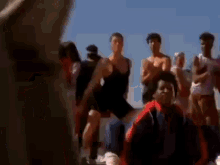 a blurry photo of a group of people dancing