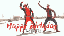 deadpool and spider-man are dancing in front of a sign that says happy birthday twins