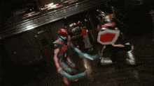 a person in a superhero costume with a red light coming out of their hand