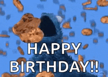 cookie monster from sesame street is surrounded by cookies and says `` happy birthday ! ''