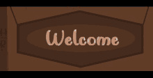 a sign that says welcome on it in brown